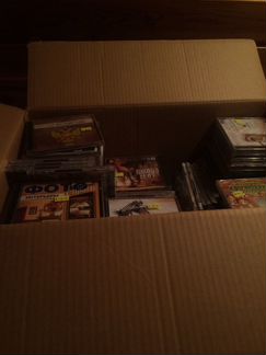 Коробка с играми с лицензией около 60 и более диск