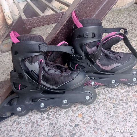 Роликовые коньки