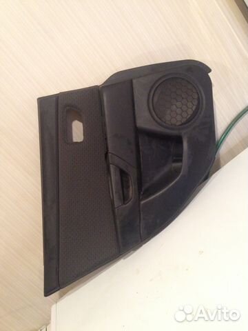 Обивка задней левой двери Мазда 3 2008г. седан