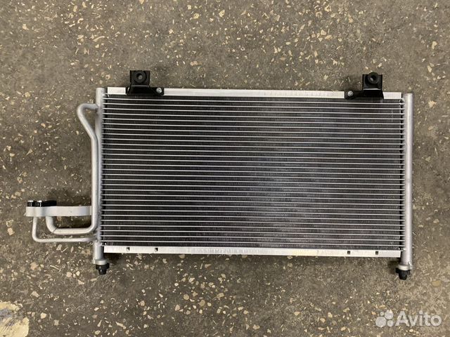 Радиатор кондиционера Kia Spectra иж