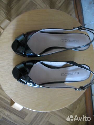 Абсолютно новые босоножки на танкетке Kapricci Абсолютно новые босоножки на танкетке Kapricci