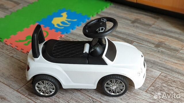 Машинка-каталка музыкальная