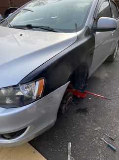 Mitsubishi Lancer 10 крыло Переднее левое
