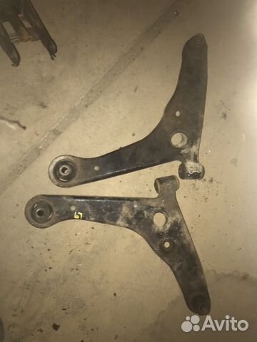 Рычаг нижний передний Лансер 9