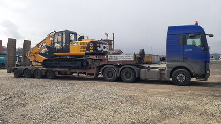 Аренда трала Перевозка спецтехники и негабарита