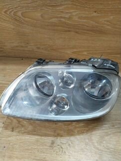 Фара передняя левая Volkswagen Touran