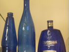 Бутылки синего стекла