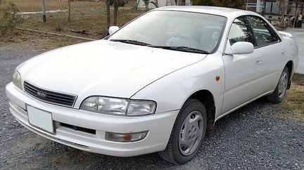 Амортизатор передний правый Toyota Corona Exiv ST2