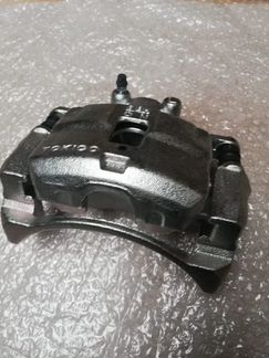 Суппорт Mitsubishi L200 4605A193 4605A194