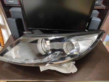 Фара левая KIA Sportage 3